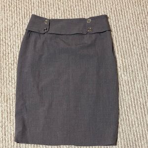 Beautiful gray pencil skirt with button detailing at the waistline and back